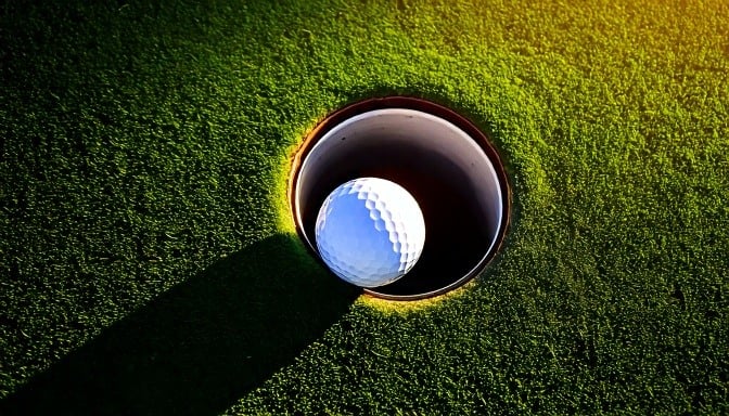 Firefly golf ball in hole 6068
